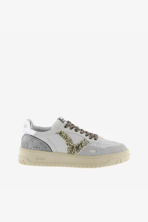 victoria Witte en gouden leren sneakers voor dames
