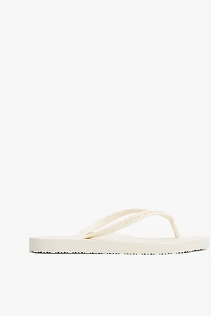Tommy Hilfiger Teenslipper met getextureerd logo