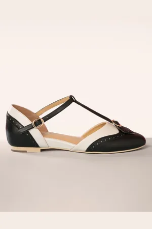 Charlie Stone Parisienne t-strap flats in zwart en crème