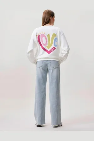 Catwalk Junkie Sweater power of love off white