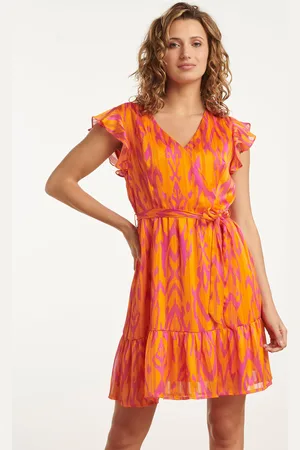 Smashed Lemon 25075 orange aztec print chiffon frilly jurk |