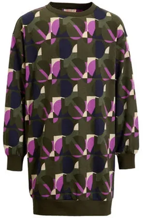Orange stars Sweaterjurk Rome met alloverprint