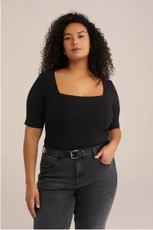WE Fashion Curve ribgebreide top zwart