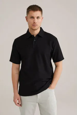 WE Fashion Relaxed polo met ingebreid patroon zwart