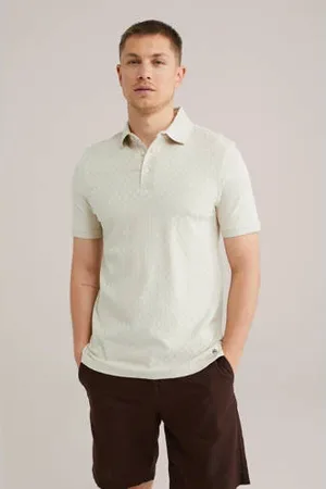 WE Fashion Slim polo met ingebreid patroon beige